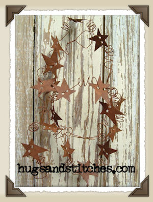 5025 - 1" Rusty Primitive Curly Wire Star Garland