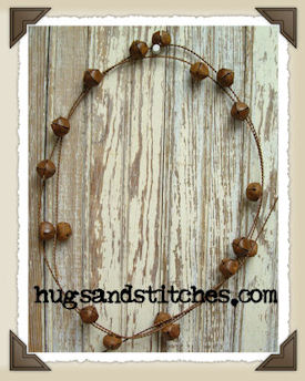5031 - 3/4" Rusty Bell Wire Garland